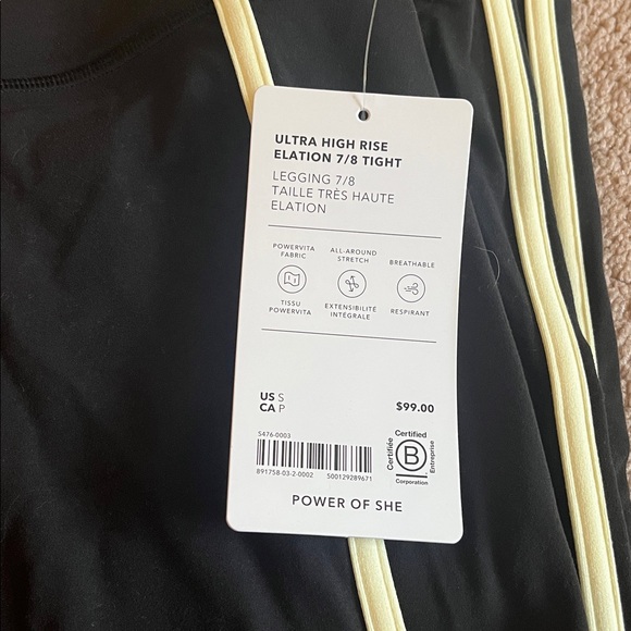 NWT Athleta Ultra High Rise Elation 7/8 Legging Size Small Black and Yellow - Picture 2 of 3
